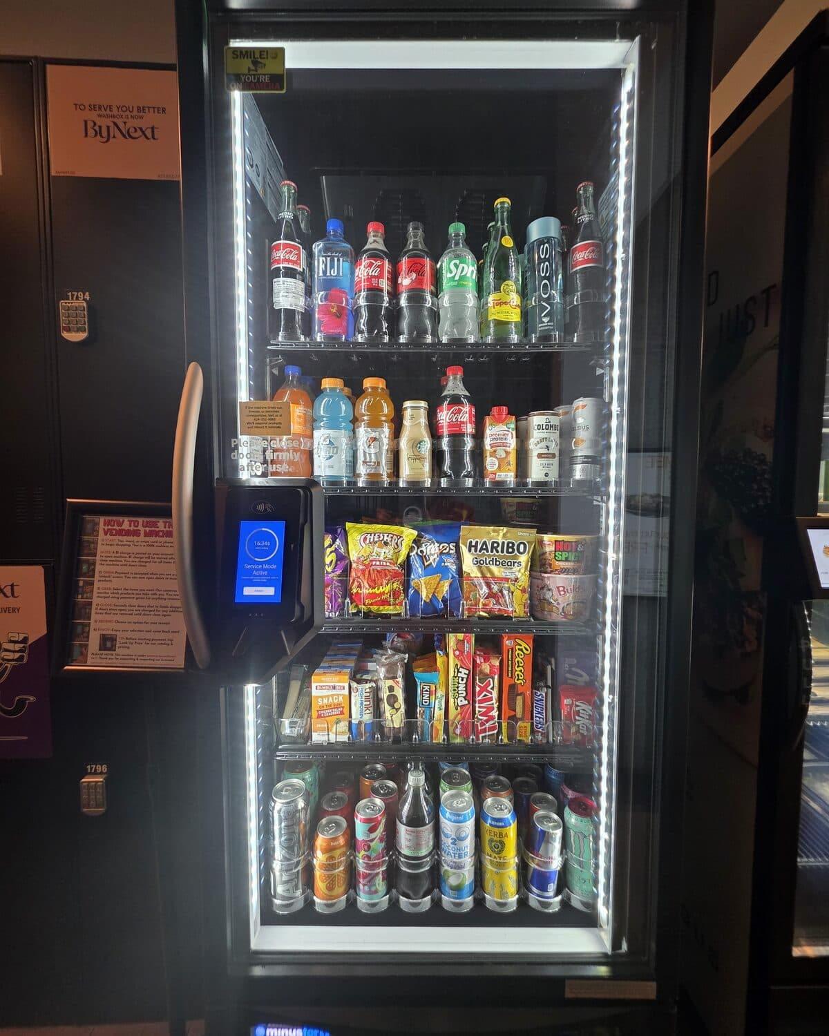 Smart cooler stocked with drinks, snacks, and essentials